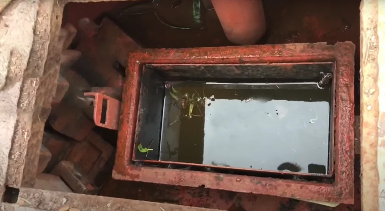 A narrowboat weedhatch. The hatch is open.